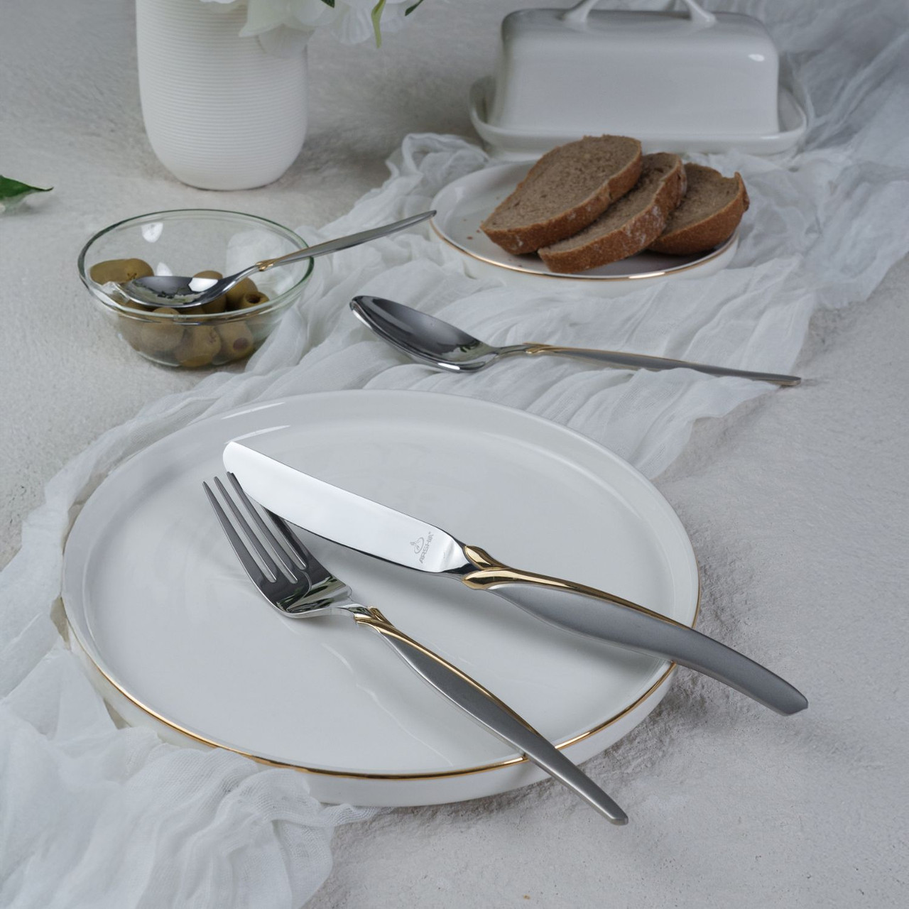 طقم ملاعق وشوك عشاء أرشيا 12 قطعة ذهبي وفضي - الصورة 2